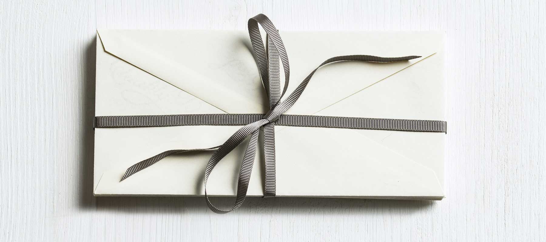 A gift voucher wrapped as a beautiful gift