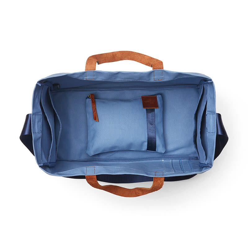 Birds eye view of blue Chica tote bag with 4 internal pockets and seperate zipped purse shown