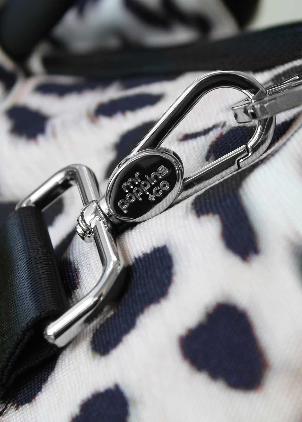 close up of chrome plated clasps of the Kahoots Leisure Bag embossed with our logo