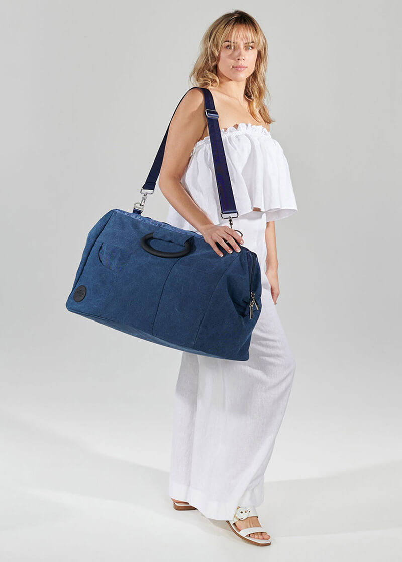 Denim weekender over shoulder with cross body strap