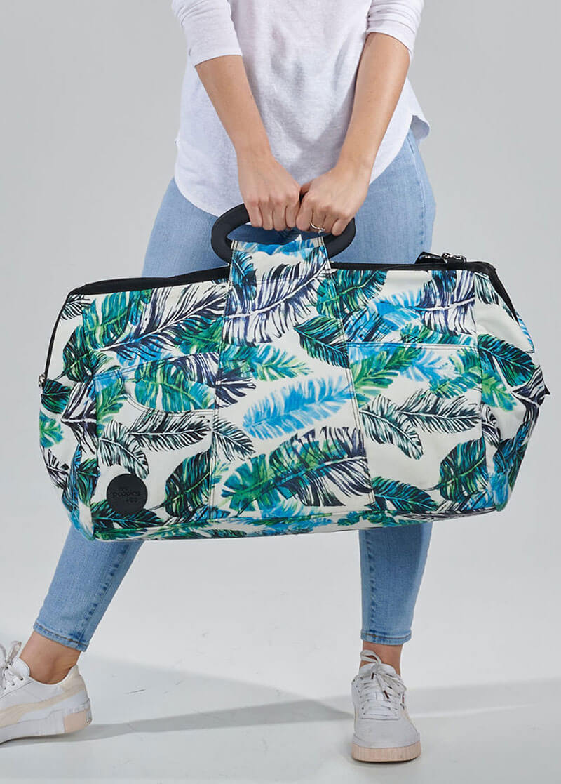 woman holding Feather weekend bag