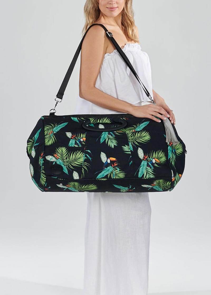 Toucan weekender with silver tassel and over shoulder strap