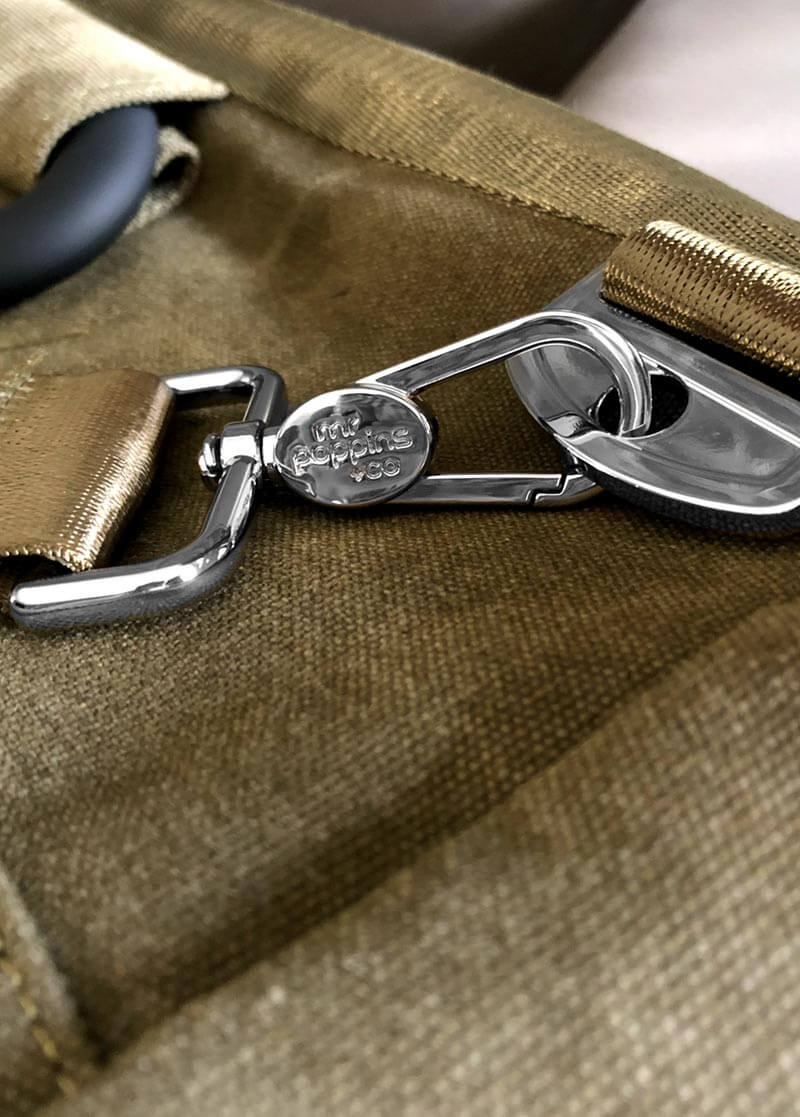 close up of chrome plated clasps of the Kahoots Leisure Bag embossed with our logo