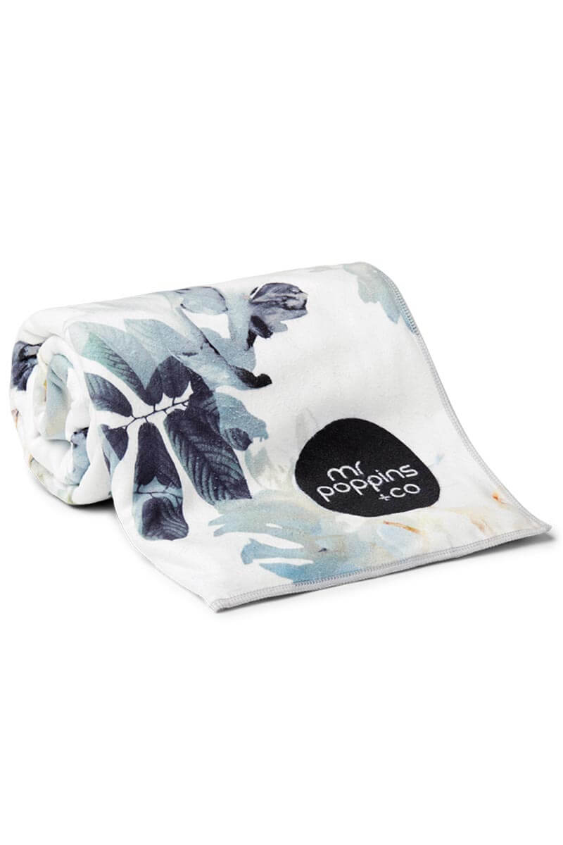 rolled up compact floral sand free towel