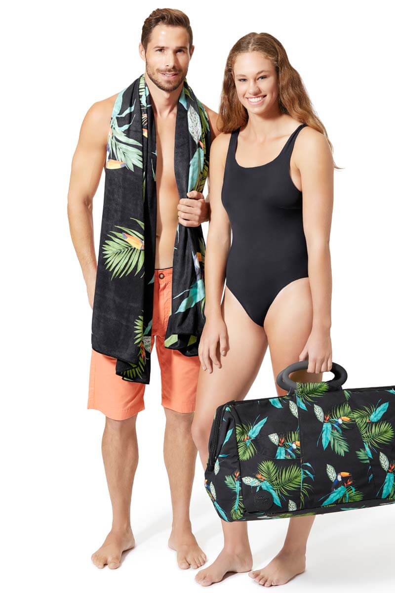 Toucan matching towel and leisure bag modelled by young couple