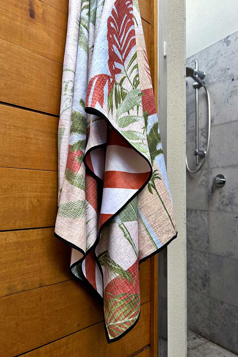 palm springs design towel hanging on outside shower door