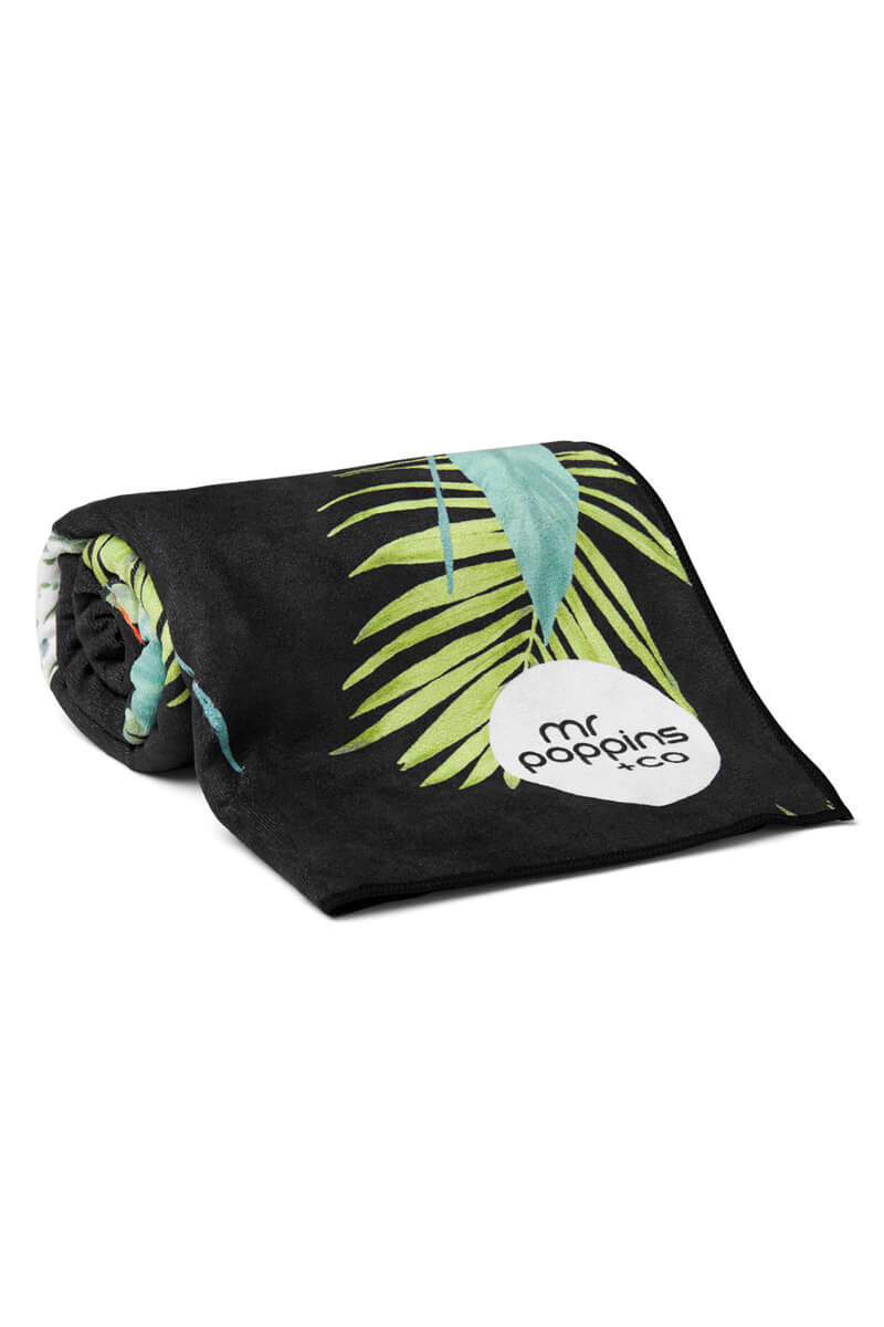 rolled up compact toucan sand free towel