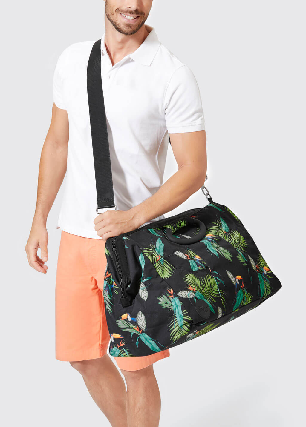 cross body strap of Toucan weekend bag on man