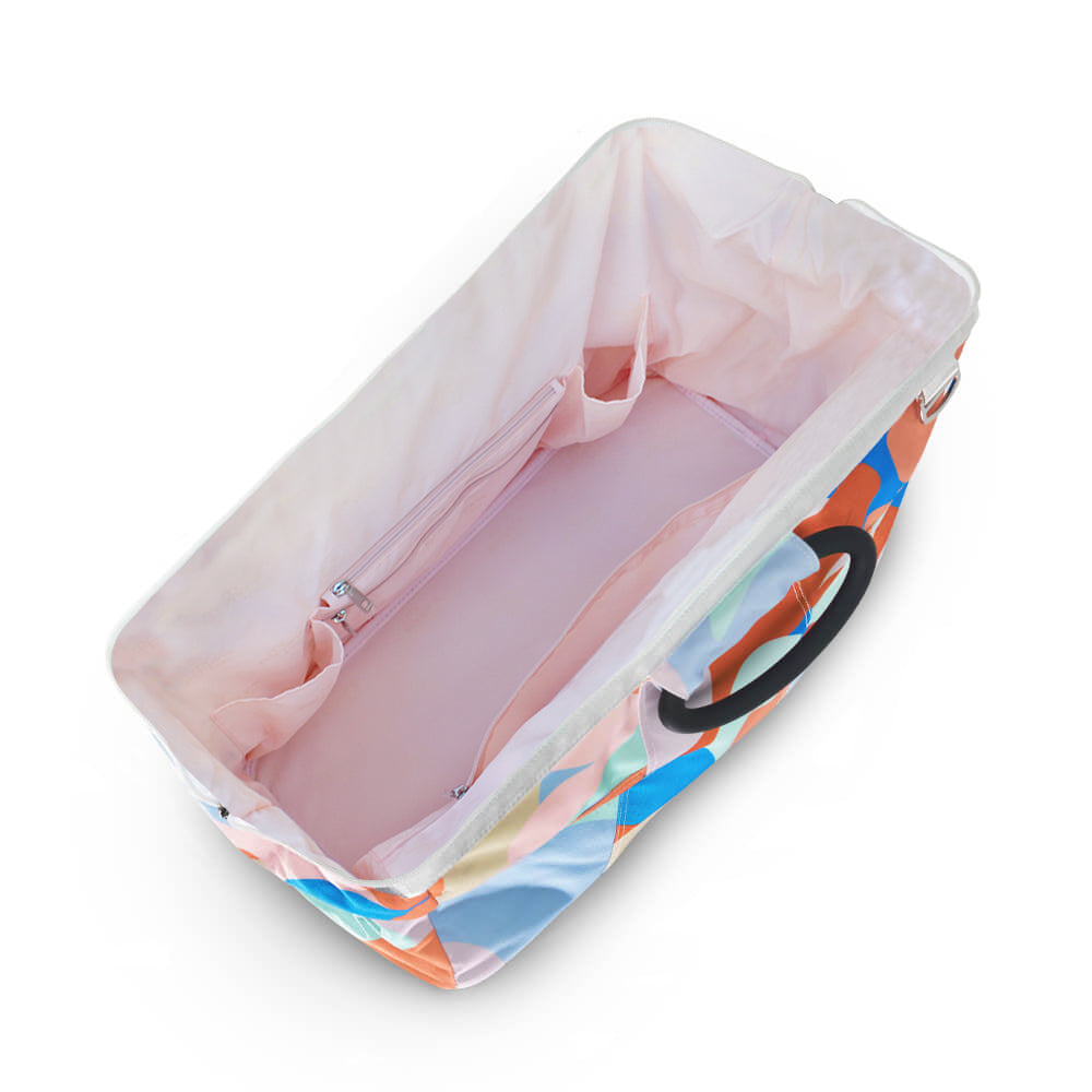 bird&#39;s eye view of dusty pink internal of weekend bag